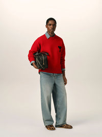 Quota Crewneck Pullover – Classic crew neck with striking heart detail
