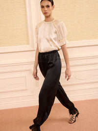 Camile Hose mit Statement Saum