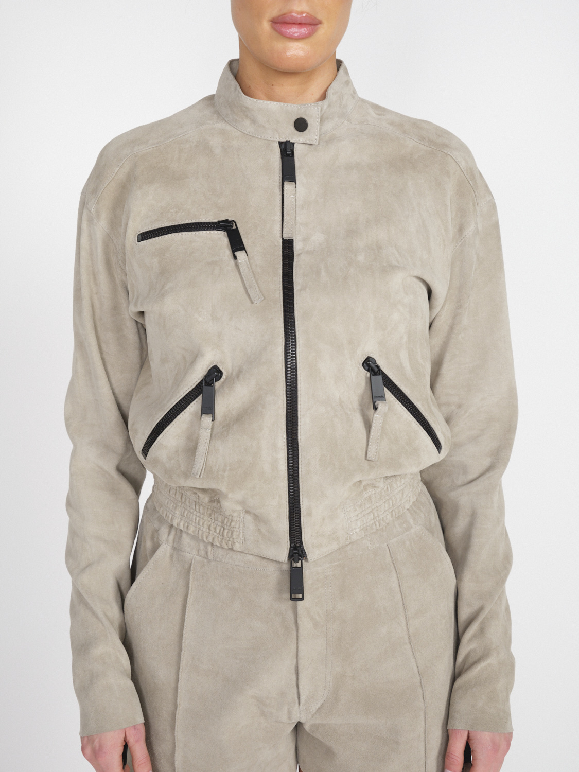 jitrois Blof – Stretchige Veloursleder-Jacke mit schwarzen Zippern  beige 34