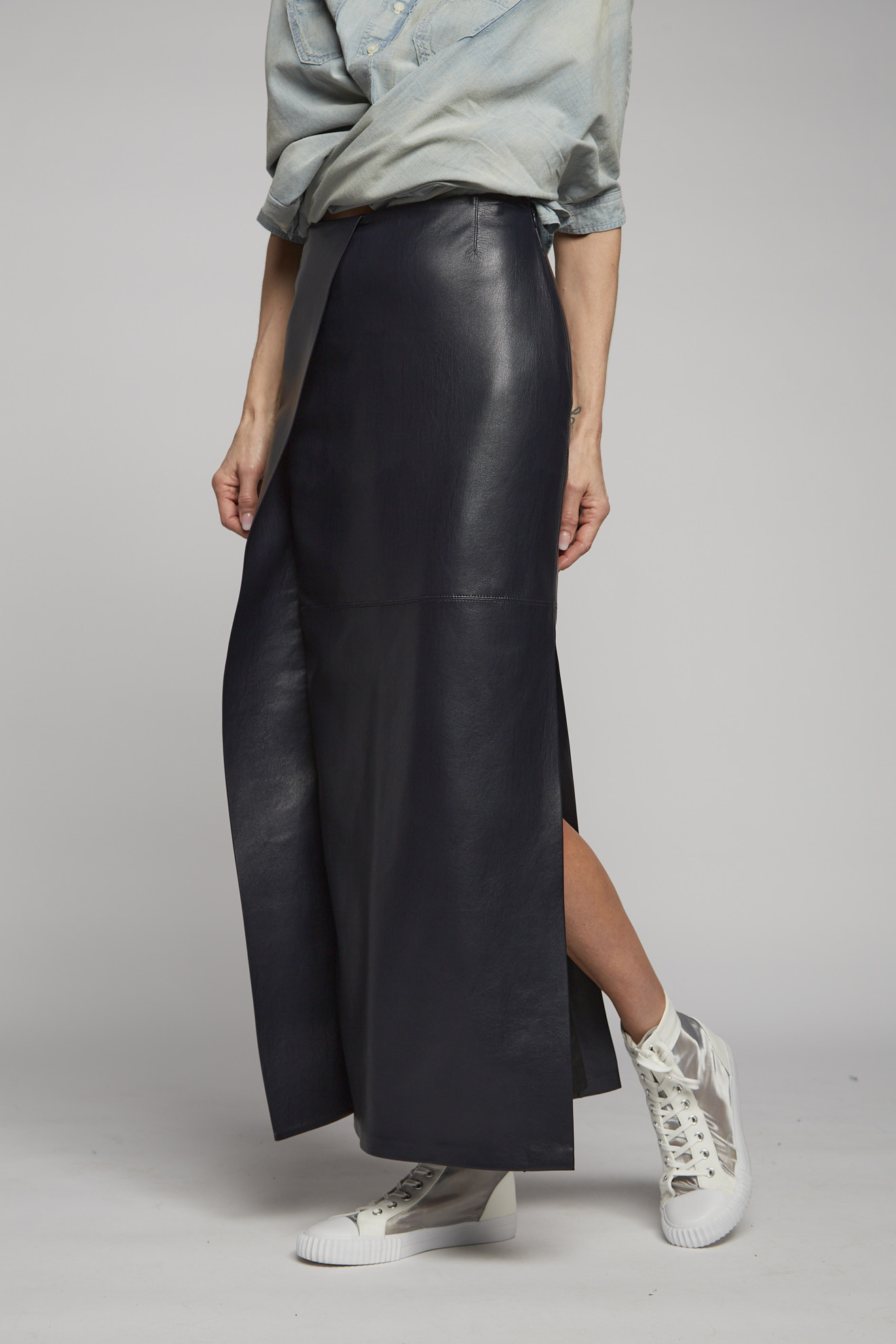 nanushka skirt black plain vegan leather model front