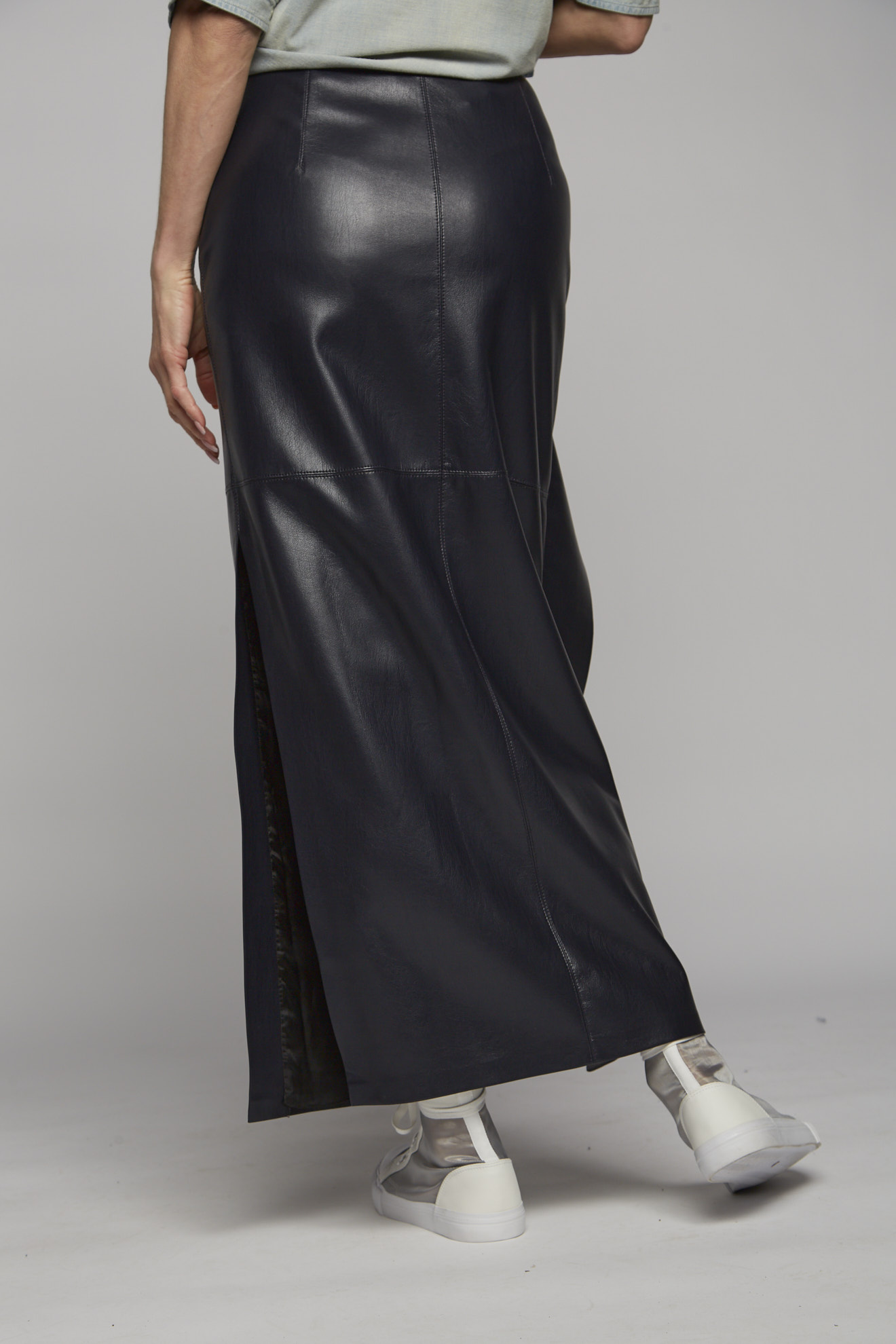 nanushka skirt black plain vegan leather model back