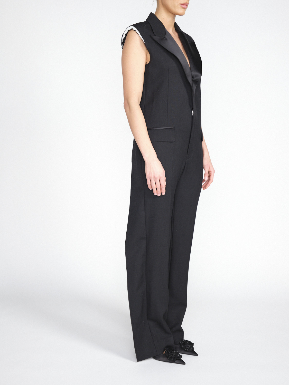Victoria Beckham Ärmelloser Smoking-Jumpsuit aus Woll-Mix Victoria Beckham Ärmelloser Smoking-Jumpsuit aus Woll-Mix
