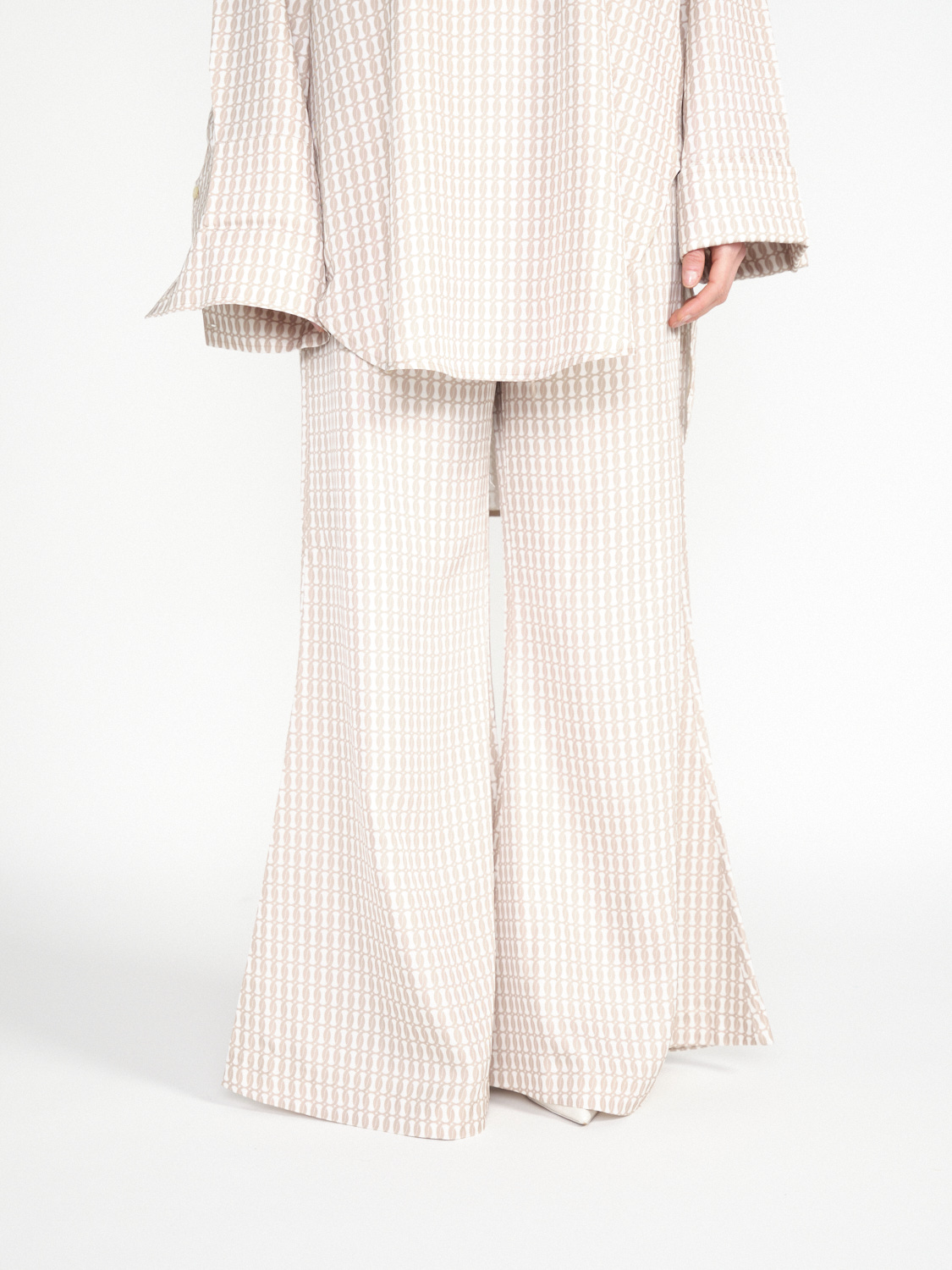 Lucee - stretchy flared trousers with monogram print 